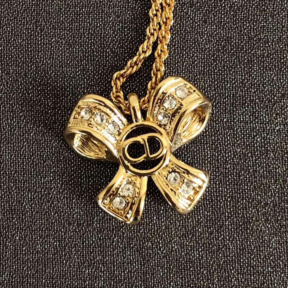 Dior bow crystal necklace gold rhinestones chain lace bow tie logo CD crest